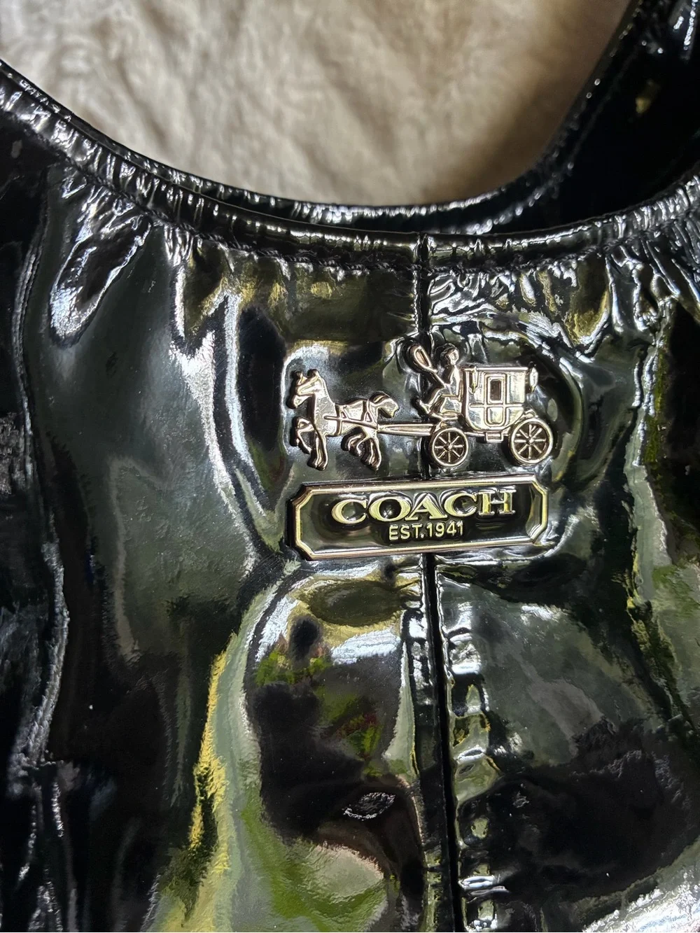 Coach glossy black